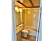 Full bathroom features a tub and shower combination, wood-look ceiling, and neutral color palette at 315 N Causeway # 2060, New Smyrna Beach, FL 32169