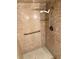 Updated shower features new tile, grab bar, and shower head at 315 N Causeway # 2060, New Smyrna Beach, FL 32169
