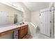 Bathroom with a vanity, a large mirror, and plenty of counter space at 3231 Bretton Woods Ter, Deltona, FL 32725