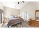 Comfortable bedroom featuring a high ceiling, and a ceiling fan at 3231 Bretton Woods Ter, Deltona, FL 32725