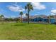 Large backyard with screened in pool with water views at 3326 S Peninsula Dr, Port Orange, FL 32127