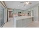 This updated kitchen boasts an oversized island, stainless appliances, and abundant cabinets at 3326 S Peninsula Dr, Port Orange, FL 32127