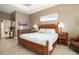 Bright bedroom featuring a bamboo bed frame, blue and white bedding, and recessed lighting at 3577 Maribella Dr, New Smyrna Beach, FL 32168
