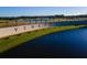 Venetian Bay community sign with manicured landscaping, golf course, and scenic water features at 3577 Maribella Dr, New Smyrna Beach, FL 32168
