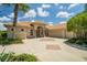 Charming single-story home with a well-manicured lawn and circular driveway with brick detailing at 3577 Maribella Dr, New Smyrna Beach, FL 32168