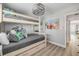Bedroom featuring a bunk bed with coastal decor that offers view of hallway at 4151 S Atlantic Ave # 3090, New Smyrna Beach, FL 32169