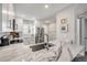 Bright kitchen boasts stainless steel appliances and white marble countertops with an undermount sink at 4151 S Atlantic Ave # 3090, New Smyrna Beach, FL 32169