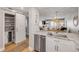 Bright kitchen with stainless steel appliances, marble countertops, and a convenient beverage station at 4151 S Atlantic Ave # 3090, New Smyrna Beach, FL 32169