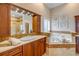 Luxurious bathroom with dual vanities and a soaking tub at 423 S Atlantic Ave # 301, New Smyrna Beach, FL 32169