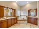 Luxurious bathroom with dual vanities, soaking tub, and marble accents at 423 S Atlantic Ave # 301, New Smyrna Beach, FL 32169