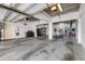 Wide angle view of an oversized garage with storage and room for parking multiple vehicles at 423 S Atlantic Ave # 301, New Smyrna Beach, FL 32169