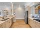 Bright modern kitchen, open to living room, featuring stainless appliances and bar seating at 423 S Atlantic Ave # 301, New Smyrna Beach, FL 32169