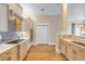 Spacious kitchen with modern appliances, custom cabinets, tile backsplash, and wooden floors at 423 S Atlantic Ave # 301, New Smyrna Beach, FL 32169