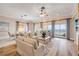 Open concept living room with a view of the ocean and modern decor at 423 S Atlantic Ave # 301, New Smyrna Beach, FL 32169