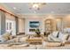 Cozy living room featuring comfortable seating, modern fireplace, and stylish decor at 423 S Atlantic Ave # 301, New Smyrna Beach, FL 32169