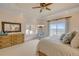 Bright main bedroom featuring balcony access and an ocean view at 423 S Atlantic Ave # 301, New Smyrna Beach, FL 32169