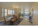 Open dining room with floor-to-ceiling windows offering ocean views at 4575 S Atlantic Ave # 6203, Ponce Inlet, FL 32127