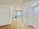 Living room featuring tile floors, recessed lighting, and large windows with blinds at 4575 S Atlantic Ave # 6203, Ponce Inlet, FL 32127