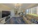 Bright living room with tile floors, stylish decor and ocean views at 4575 S Atlantic Ave # 6203, Ponce Inlet, FL 32127