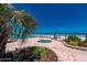 Backyard oasis featuring a pool, jacuzzi, landscaped garden and ocean view at 4575 S Atlantic Ave # 6203, Ponce Inlet, FL 32127