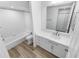 Bathroom with white cabinets, modern fixtures, and shower/tub combo at 4620 Riverwalk Village Ct # 7403, Ponce Inlet, FL 32127