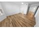 Bright bedroom with wood floors, closet, and doorway, offering a spacious layout at 4620 Riverwalk Village Ct # 7403, Ponce Inlet, FL 32127
