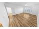 Spacious bedroom with wood-look floors, bright windows, and a walk-in closet at 4620 Riverwalk Village Ct # 7403, Ponce Inlet, FL 32127