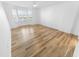Bedroom with bay window, ceiling fan and hardwood flooring at 4620 Riverwalk Village Ct # 7403, Ponce Inlet, FL 32127