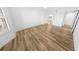 Bedroom featuring wood floors, natural light, and a calming atmosphere at 4620 Riverwalk Village Ct # 7403, Ponce Inlet, FL 32127