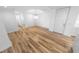 Open-concept dining area with chandelier and wood floors at 4620 Riverwalk Village Ct # 7403, Ponce Inlet, FL 32127