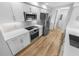 Gorgeous kitchen features stainless appliances, quartz countertops, and modern finishes at 4620 Riverwalk Village Ct # 7403, Ponce Inlet, FL 32127
