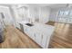 Gourmet kitchen with a center island, stainless steel appliances, and ample cabinetry at 4620 Riverwalk Village Ct # 7403, Ponce Inlet, FL 32127