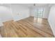 Bright living room with luxury floors, ceiling fan and plantation shutters at 4620 Riverwalk Village Ct # 7403, Ponce Inlet, FL 32127