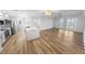 Open-concept living space features wood floors, recessed lighting and large windows at 4620 Riverwalk Village Ct # 7403, Ponce Inlet, FL 32127