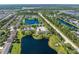 Aerial view of community, with water views and community amenities in close proximity at 511 Mount Olympus Blvd, New Smyrna Beach, FL 32168