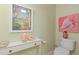 Charming bathroom with decorative accents and beach themed decor at 511 Mount Olympus Blvd, New Smyrna Beach, FL 32168