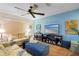Comfortable living room with coastal decor and a large TV, perfect for relaxing at 511 Mount Olympus Blvd, New Smyrna Beach, FL 32168