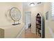 Upstairs hallway featuring a boat bookcase and window view at 511 Mount Olympus Blvd, New Smyrna Beach, FL 32168