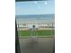 Enjoy the beach view from this balcony with table and seating at 5201 S Atlantic Ave # 407A, New Smyrna Beach, FL 32169