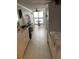 Hallway leading to living room and dining area with ocean view at 5201 S Atlantic Ave # 407A, New Smyrna Beach, FL 32169