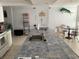 Spacious kitchen featuring a large island, sink, and dining area at 5201 S Atlantic Ave # 407A, New Smyrna Beach, FL 32169