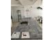 Kitchen island featuring a sink with tile countertop, and decor at 5201 S Atlantic Ave # 407A, New Smyrna Beach, FL 32169