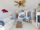 Inviting living room with an open floor plan to the bar and kitchen, great for entertaining at 5201 S Atlantic Ave # 407A, New Smyrna Beach, FL 32169