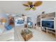 Inviting living room with an open floor plan to the bar and kitchen, great for entertaining at 5201 S Atlantic Ave # 407A, New Smyrna Beach, FL 32169