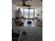 Bright living room with comfortable seating and beautiful ocean view at 5201 S Atlantic Ave # 407A, New Smyrna Beach, FL 32169
