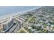 Overhead view showcasing the property's location near the beach, hotels, and tennis courts at 525 N Atlantic Ave # 39, New Smyrna Beach, FL 32169