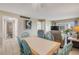 This beautiful dining area is open to the living room with bathroom access on the other side at 525 N Atlantic Ave # 39, New Smyrna Beach, FL 32169