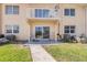 Building exterior featuring a patio, balcony and direct access to the grassy lawn at 525 N Atlantic Ave # 39, New Smyrna Beach, FL 32169