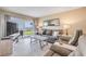 Comfortable living room featuring a sliding glass door to the outdoor space, perfect for relaxing at 525 N Atlantic Ave # 39, New Smyrna Beach, FL 32169