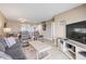 This lovely living room connects to the dining area, creating a spacious and airy ambiance at 525 N Atlantic Ave # 39, New Smyrna Beach, FL 32169